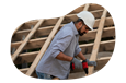 Roofing professional installing materials.