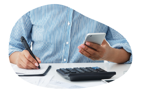 A consultant calculating business insurance costs. A consultant calculating business insurance costs.