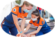 Two EMS professionals check vitals on a patient