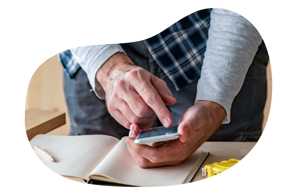 The owner of a landscaping business calculating insurance costs. The owner of a landscaping business calculating insurance costs.
