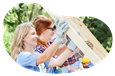 A group of volunteers helps build a home.