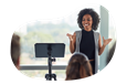 A public speaker addressing a conference room for a presentation.