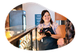 An employee at a cannabis dispensary chats with a customer.