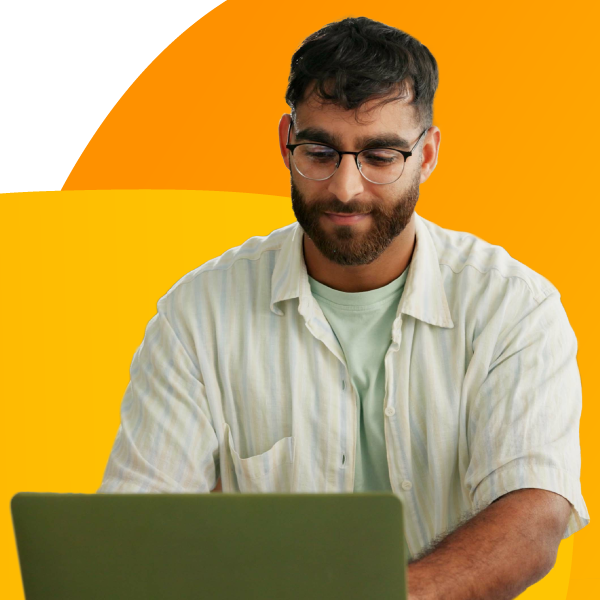An e-commerce business retailer checking different insurance plans on their laptop